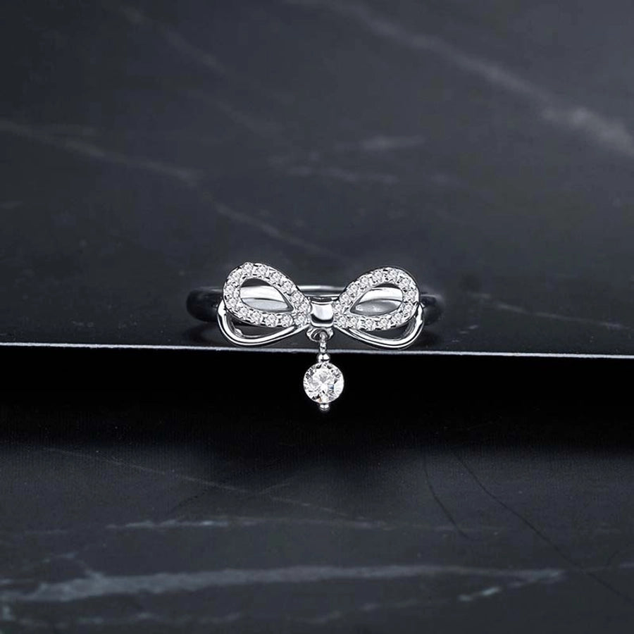 Sterling Silver Bling Bow Ring with Dangle